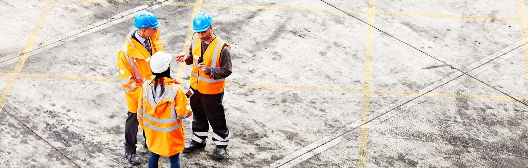 Apprentice onsite in PPE with supervisors