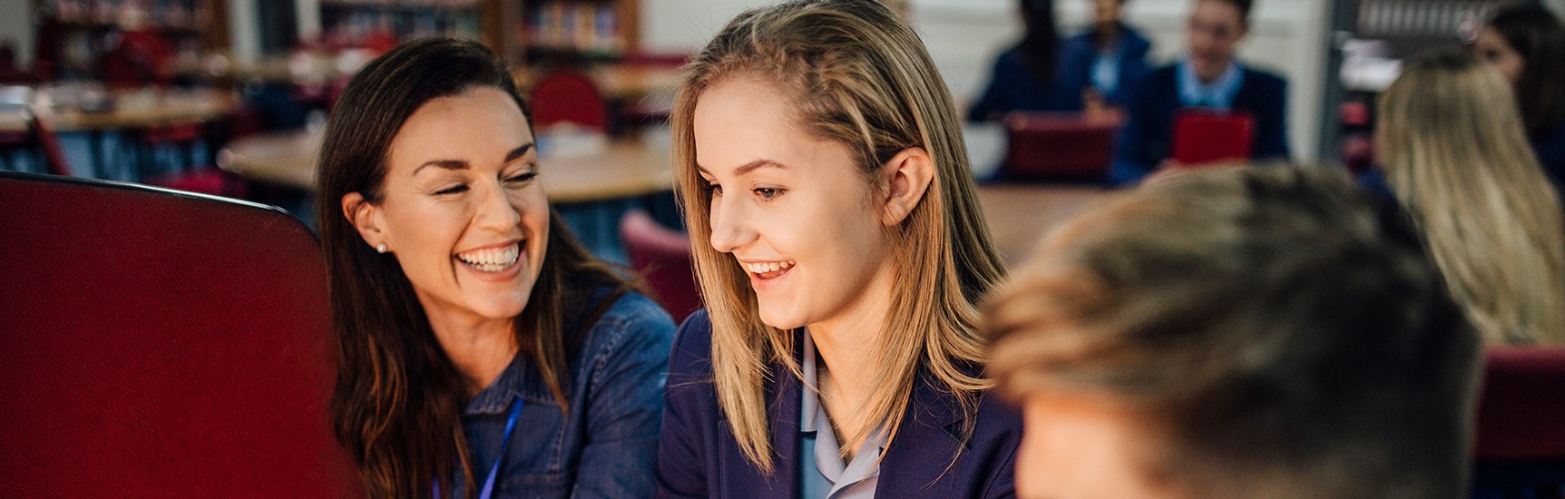 School students in libary discussing